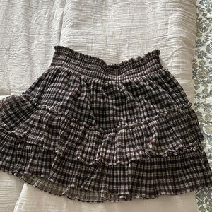 LINI Checkered Mini Skirt with gold accent